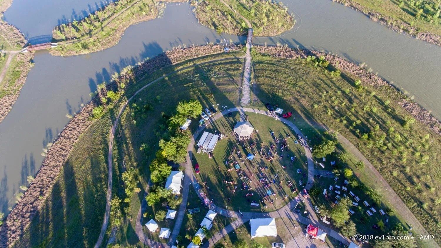 Aerial view of the MusicFest crowd, tents and stage at Willow Waterhole in 2018